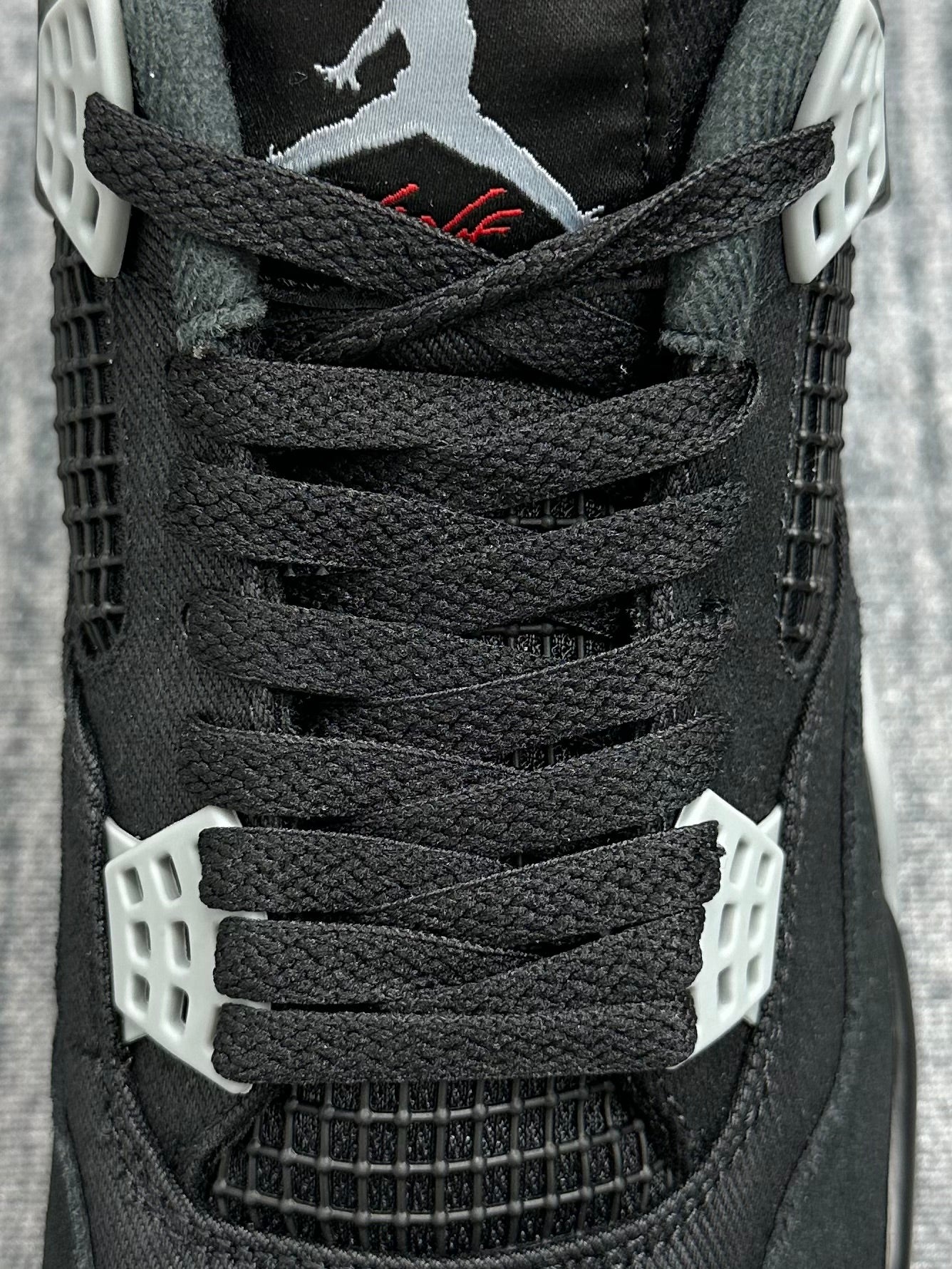 AJ4 BLACK CANVAS